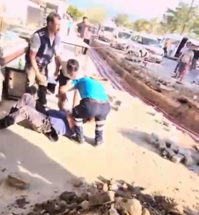 Bursa'da kafeterya yıkımında ortalık karıştı. Bir polis yaralı