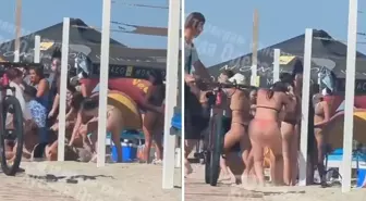 Kadınlar yasaklı Rusça şarkı yüzünden plajda saç başa kavga etti